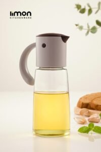 graceful pour oil dispenser with handle by limon